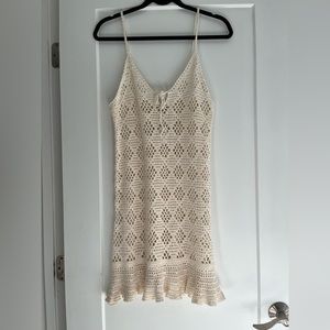 Crochet dress and/or cover up. Super cute and flattering. Never worn.